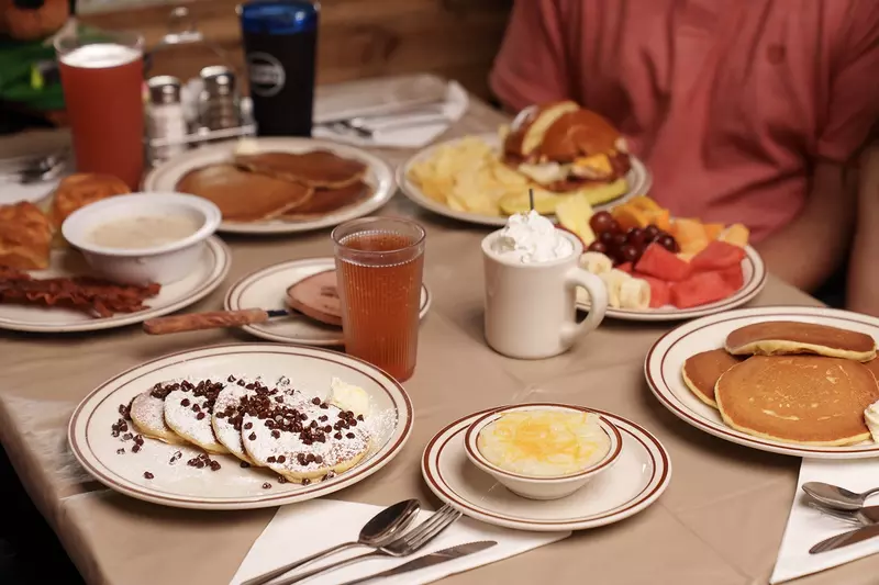 plates of breakfast food on table
