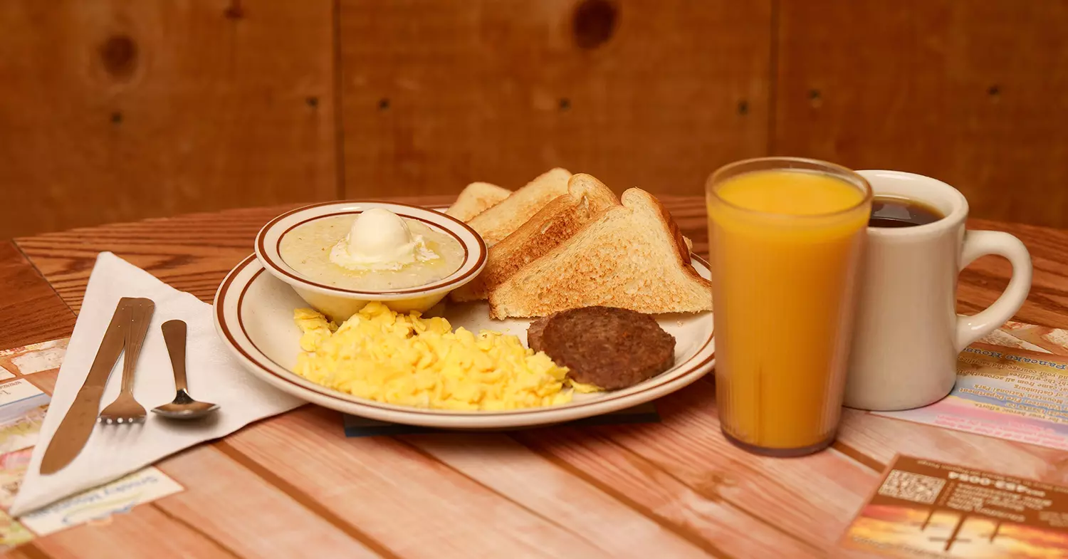 pancakes, eggs, sausage, hashbrowns, bacon