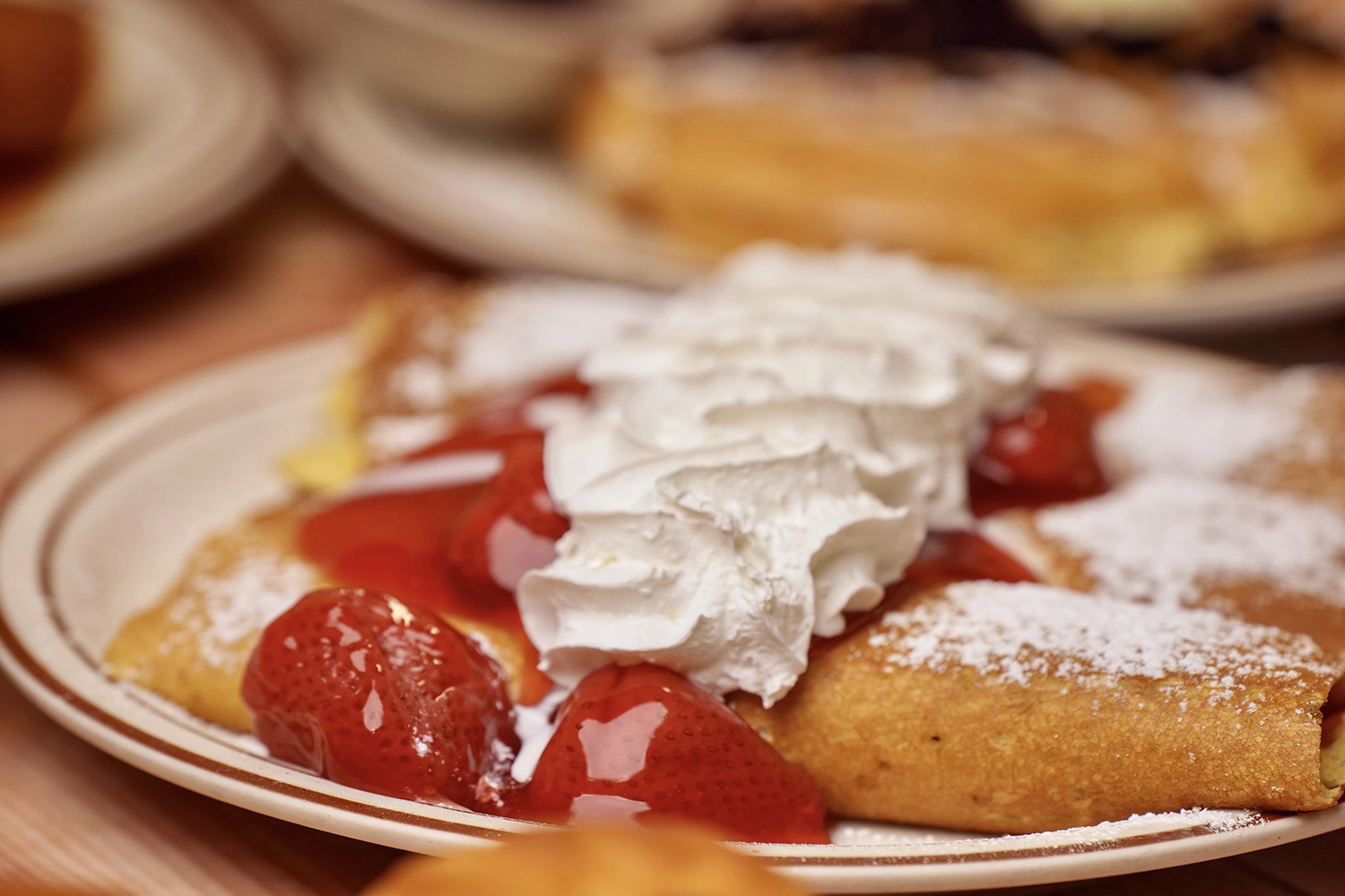 strawberry crepes with whipped cream